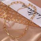 ClaudiaG Collection statement silver link necklace elegantly displayed on a textured background