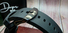 Dapr men's steel watch sale featuring a close-up of the black strap and clasp detail