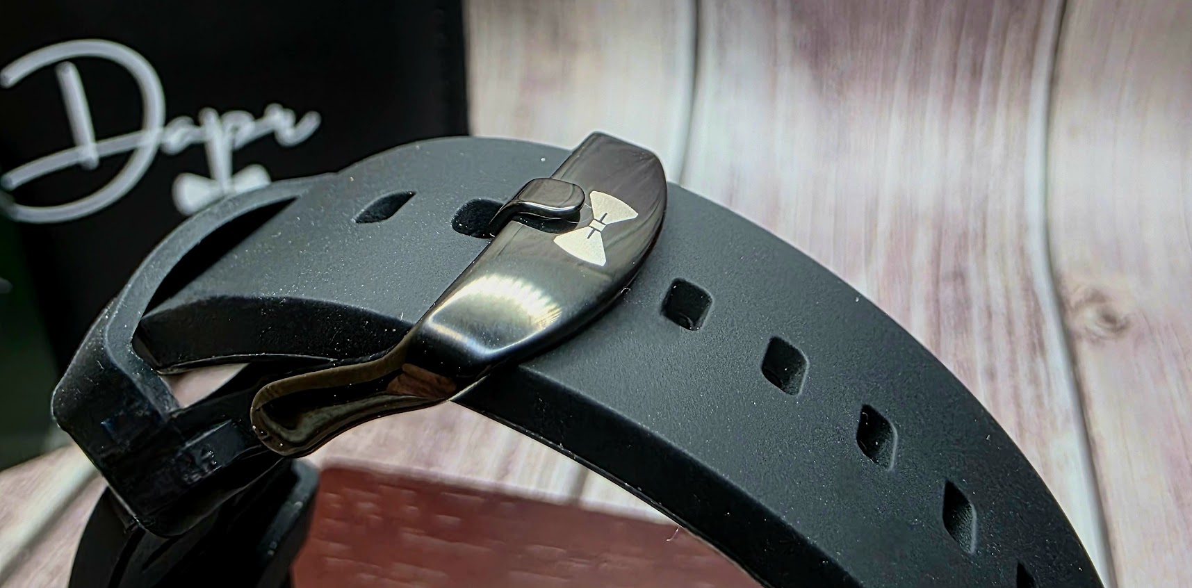 Dapr men's steel watch sale featuring a close-up of the black strap and clasp detail