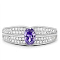 Sterling silver cocktail ring for women featuring a purple gemstone and sparkling accents