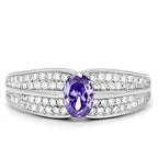 Sterling silver cocktail ring for women featuring a purple gemstone and sparkling accents