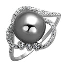 Sterling silver cocktail ring featuring a large pearl and sparkling stone accents for elegant occasions