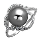 Sterling silver cocktail ring featuring a large pearl and sparkling stone accents for elegant occasions