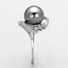 Elegant sterling silver cocktail ring featuring a large gray pearl and sparkling accent stones