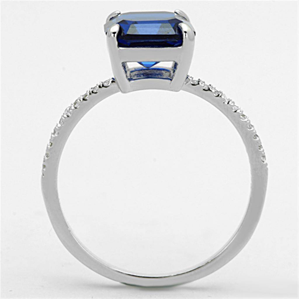 Elegant sterling silver engagement ring for women featuring a blue emerald-cut stone and sparkling accents