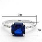 Sterling silver engagement ring for women featuring a large blue gemstone and sparkling accents