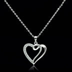 Sterling silver heart pendant jewelry with a unique twisted design and sparkling stones