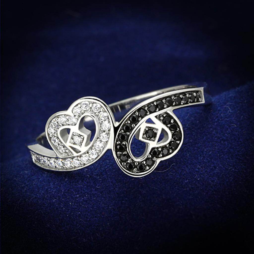 Sterling silver heart ring for women adorned with sparkling black and white stones