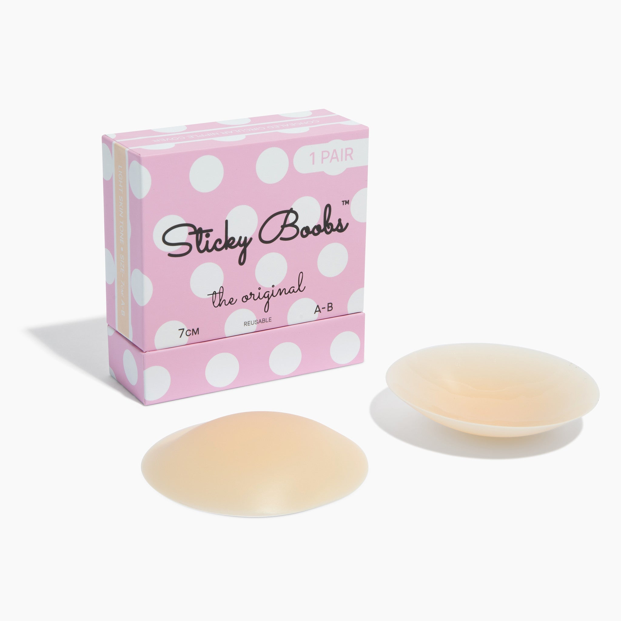 Original sticky boobs adhesive bra in nude with a pink dotted box for seamless support