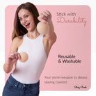 Sticky Boobs Reusable and Washable perfect fit non adhesive bra pads held by a smiling woman for a secure feel