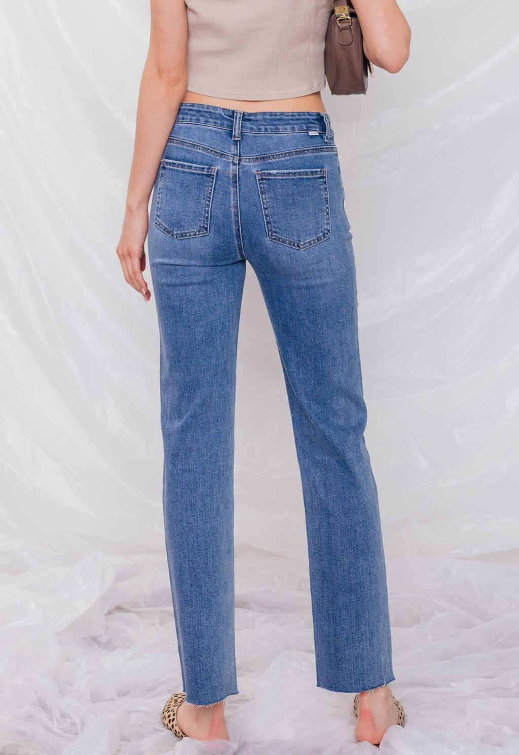 Women's straight leg blue jeans with a classic fit, ideal for casual wear