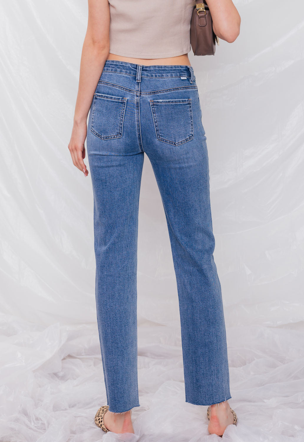 Women's straight leg blue jeans with a classic fit, ideal for casual wear