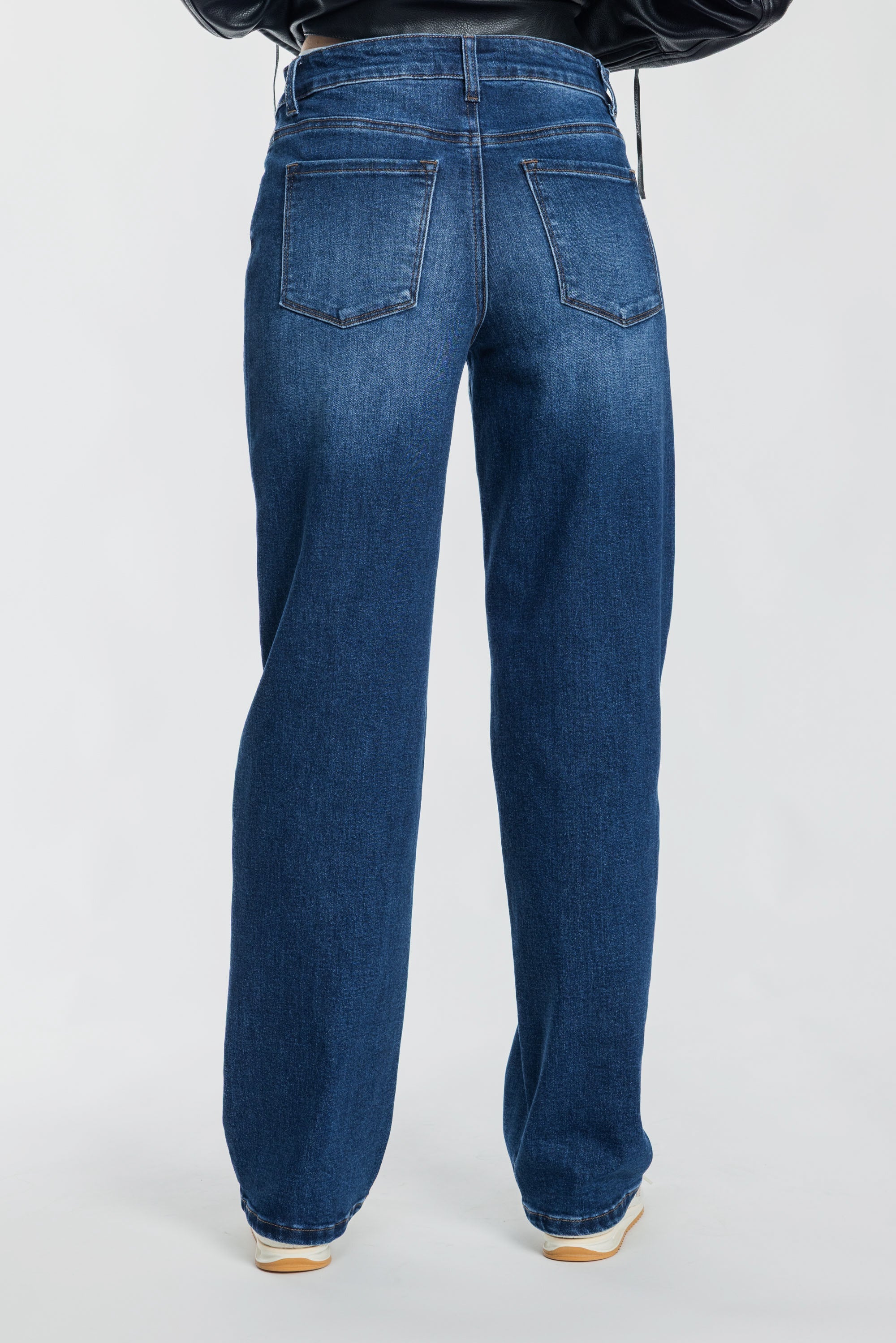Women's straight leg blue jeans in a classic denim wash