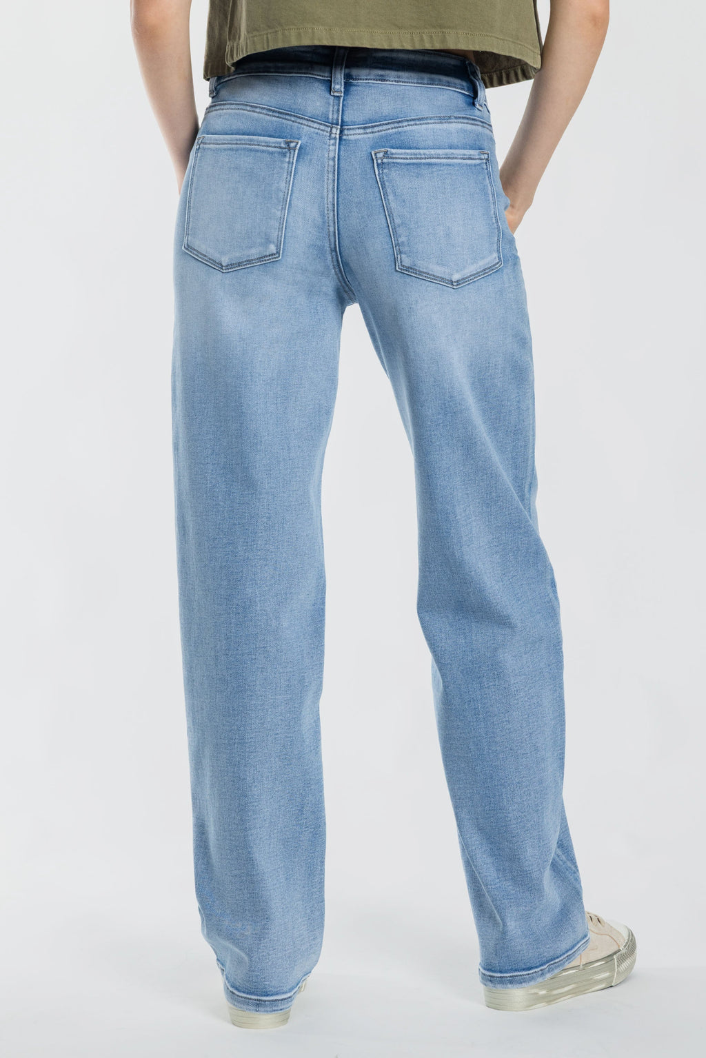 Women's straight leg blue jeans in light wash, perfect for casual wear