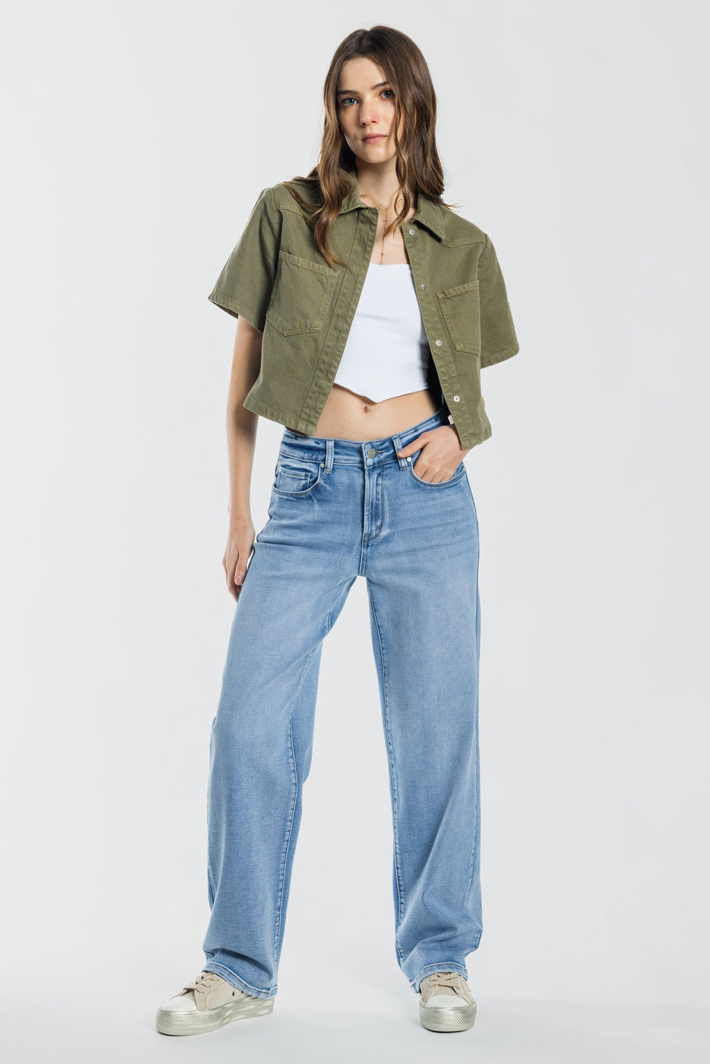 Women's straight leg blue jeans in light wash, perfect for casual wear
