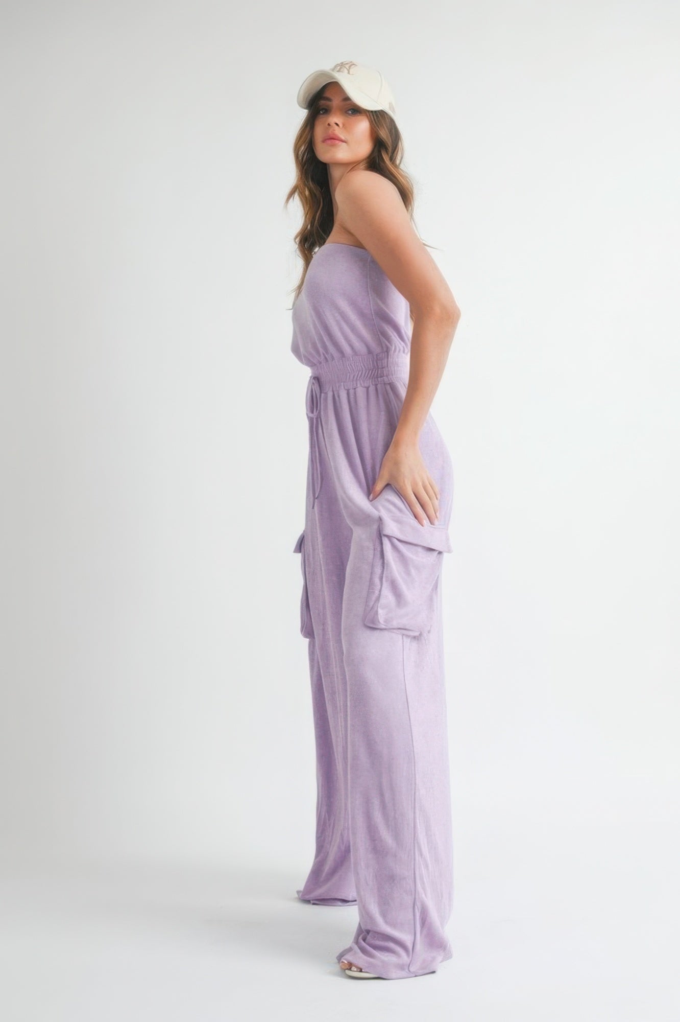 Lavender strapless romper jumpsuit with side pockets and drawstring waist for casual summer wear