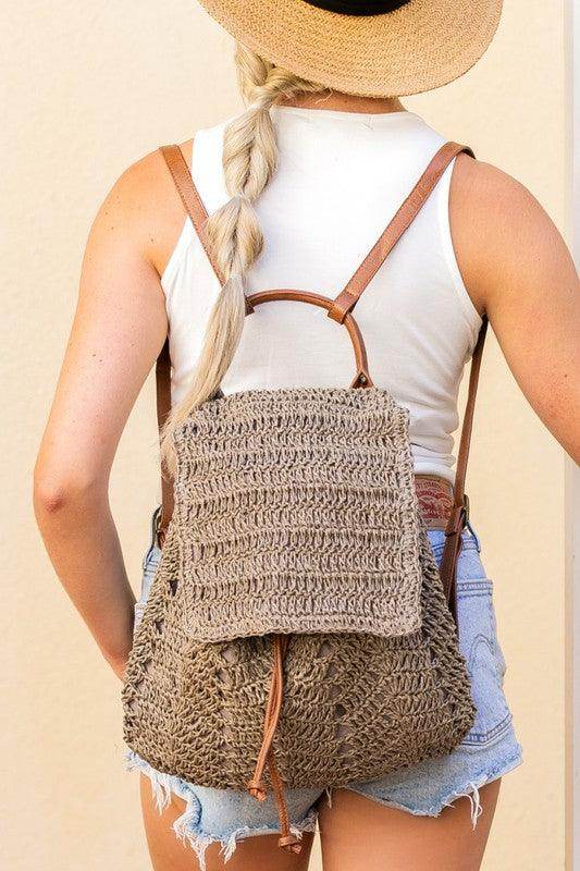 Stylish straw beach backpack with adjustable straps for summer outings and beach days
