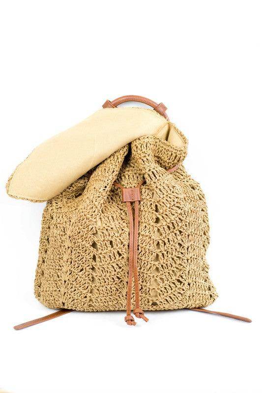 Aili's Corner straw beach backpack with a drawstring closure and of natural woven design