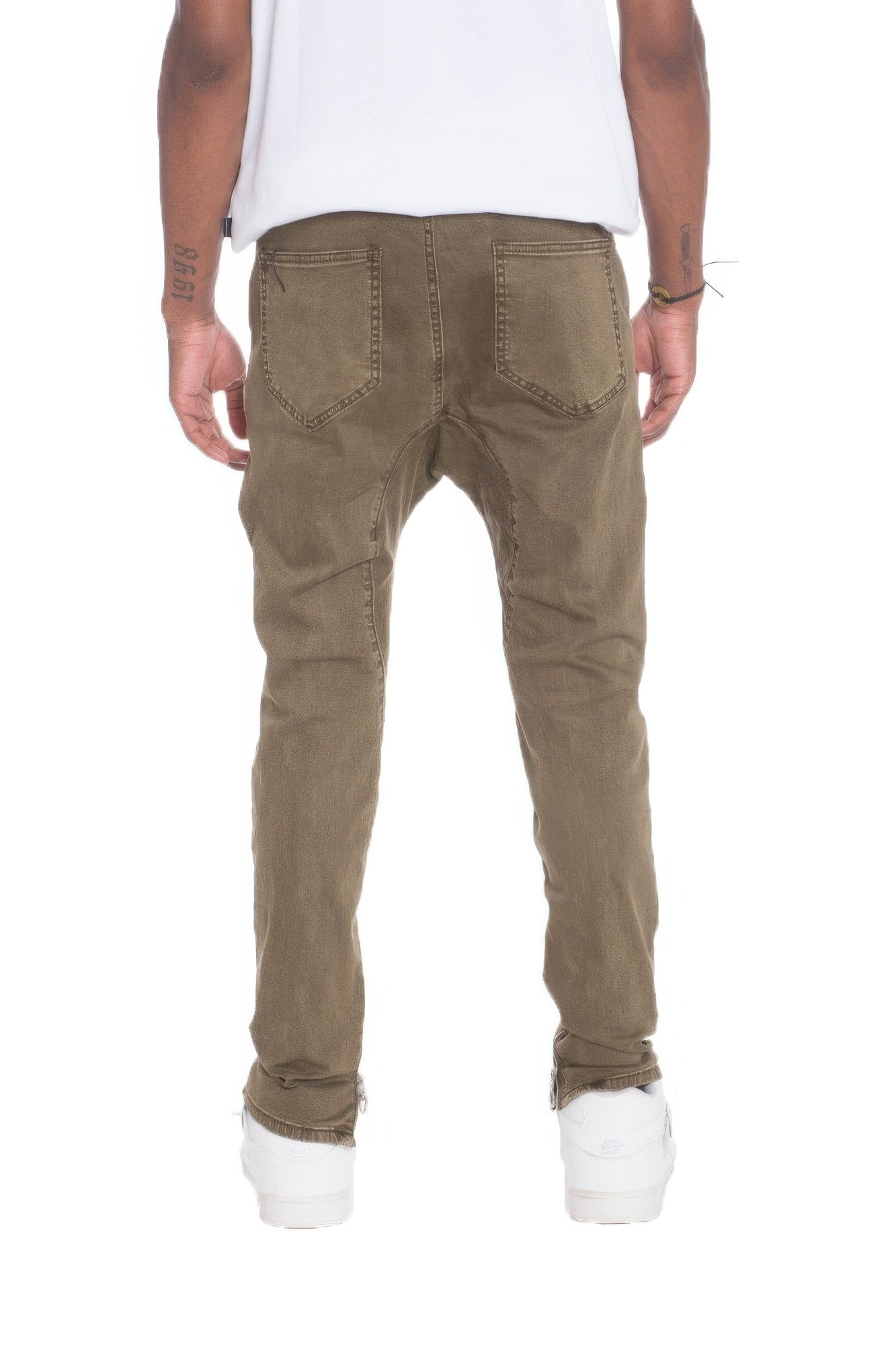 Men's street style distressed pants in olive green jeans by VacationGrabs shown from the back