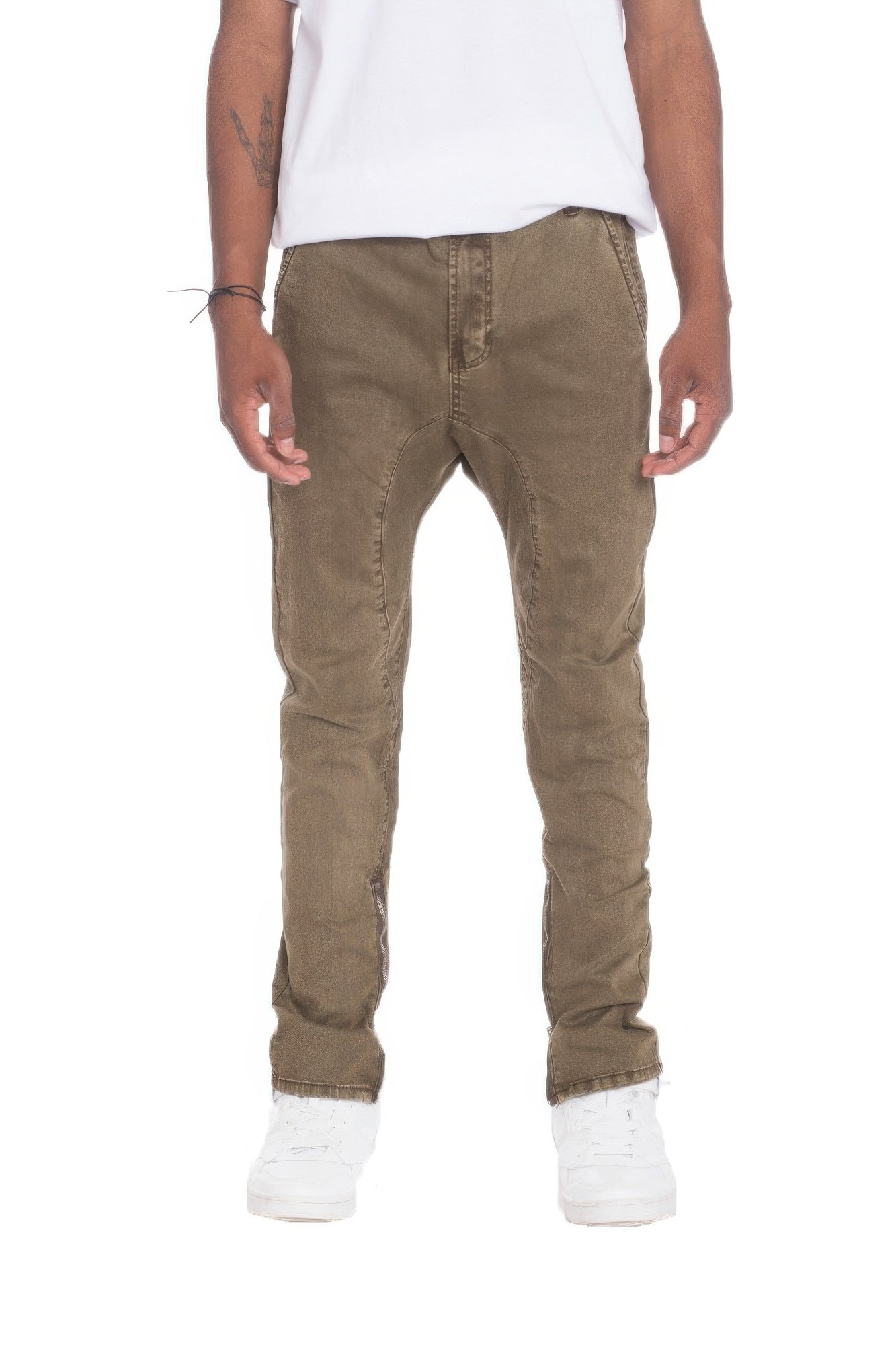 Men's street style distressed pants by VacationGrabs in brown with a relaxed fit and casual white sneakers