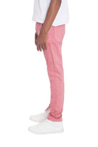 Men's pink street style distressed pants from VacationGrabs paired with white sneakers