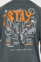 Back of grey short sleeve streetwear shirt with artistic graphic design and motivational text