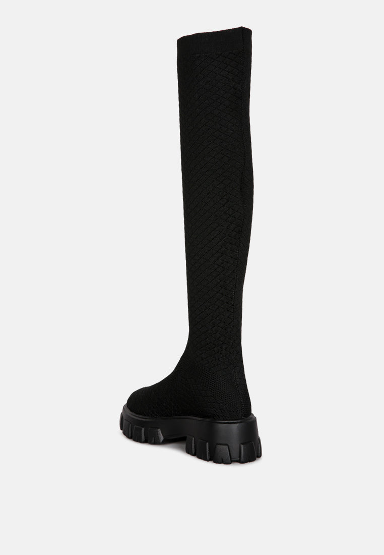 Black stretch knit knee high boots with chunky soles for women's stylish footwear