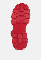 Red stretch knit knee high boots by London Rag International with durable traction sole