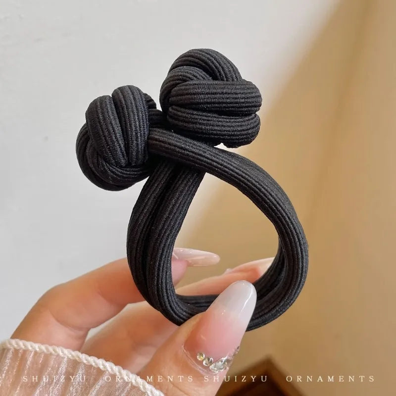 Black stretch rubber hair ties for women, ideal for everyday use