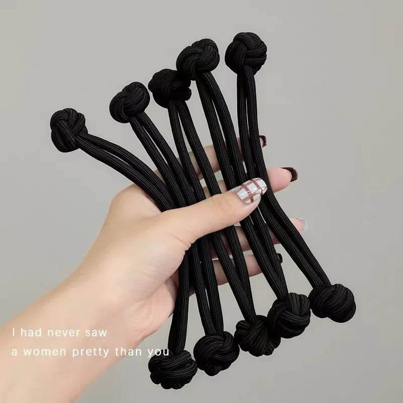 Black stretch rubber hair ties for women, ideal for creating stylish hairstyles