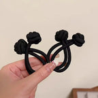 Black stretch rubber hair ties for women, perfect for daily use