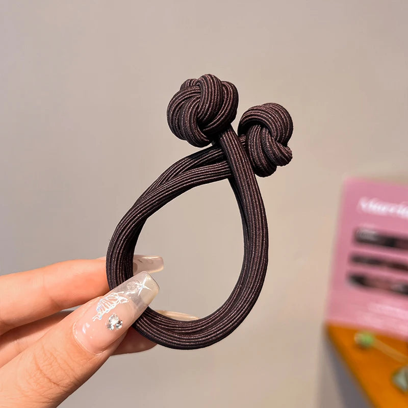 Stretch rubber hair ties for women in dark brown, perfect for styling hair