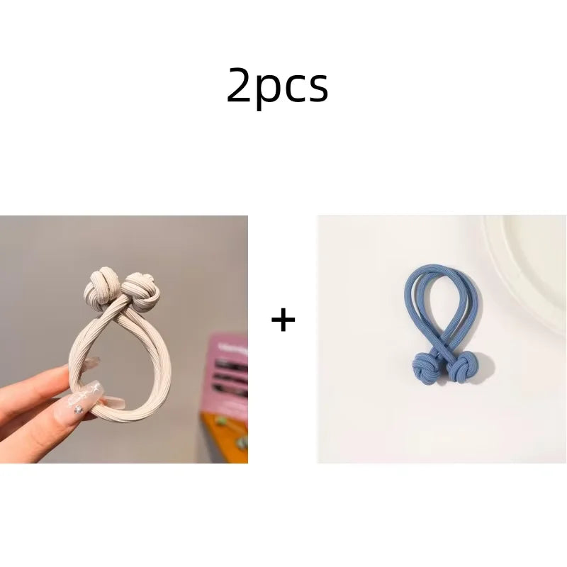 Two stretch rubber hair ties for women, soft and versatile, perfect for daily use