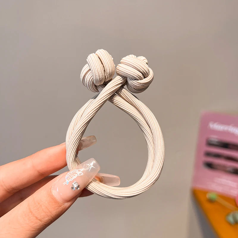 Beige stretch rubber hair ties for women, perfect for everyday hairstyles