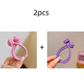 Set of 2 stretch rubber hair ties for women in pink and purple