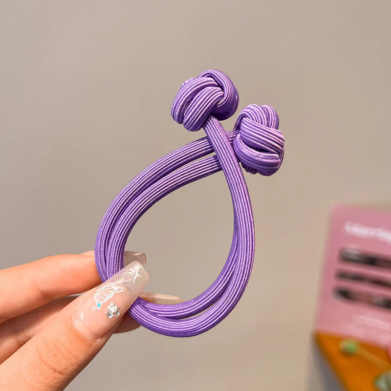 Purple stretch rubber hair ties for women, perfect for everyday hairstyles