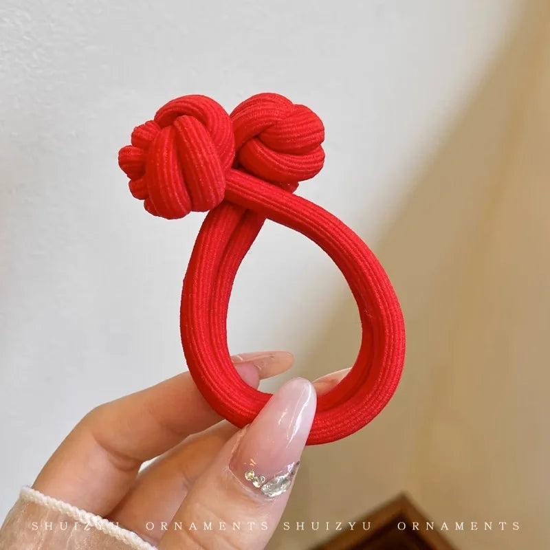 Red stretch rubber hair ties for women, perfect for everyday use