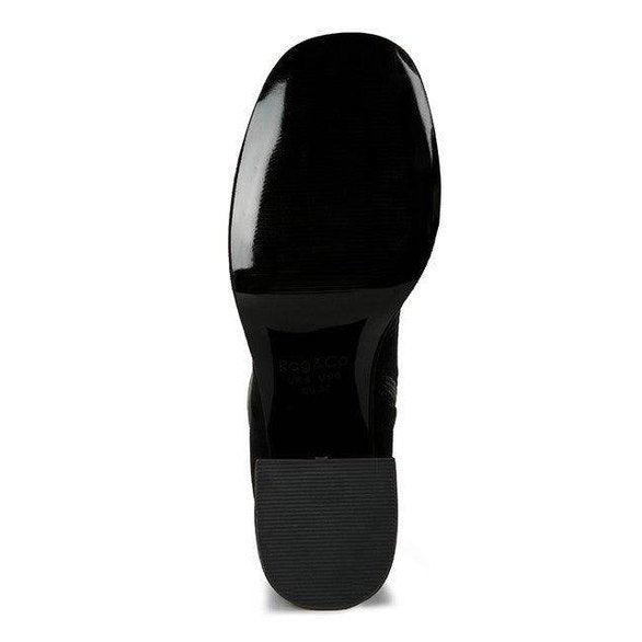 Bottom view of Rag Company stretch suede boots for women with a sleek black sole design