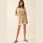 VacationGrabs women's beige striped knit sweater shorts with drawstring waist and matching knit top