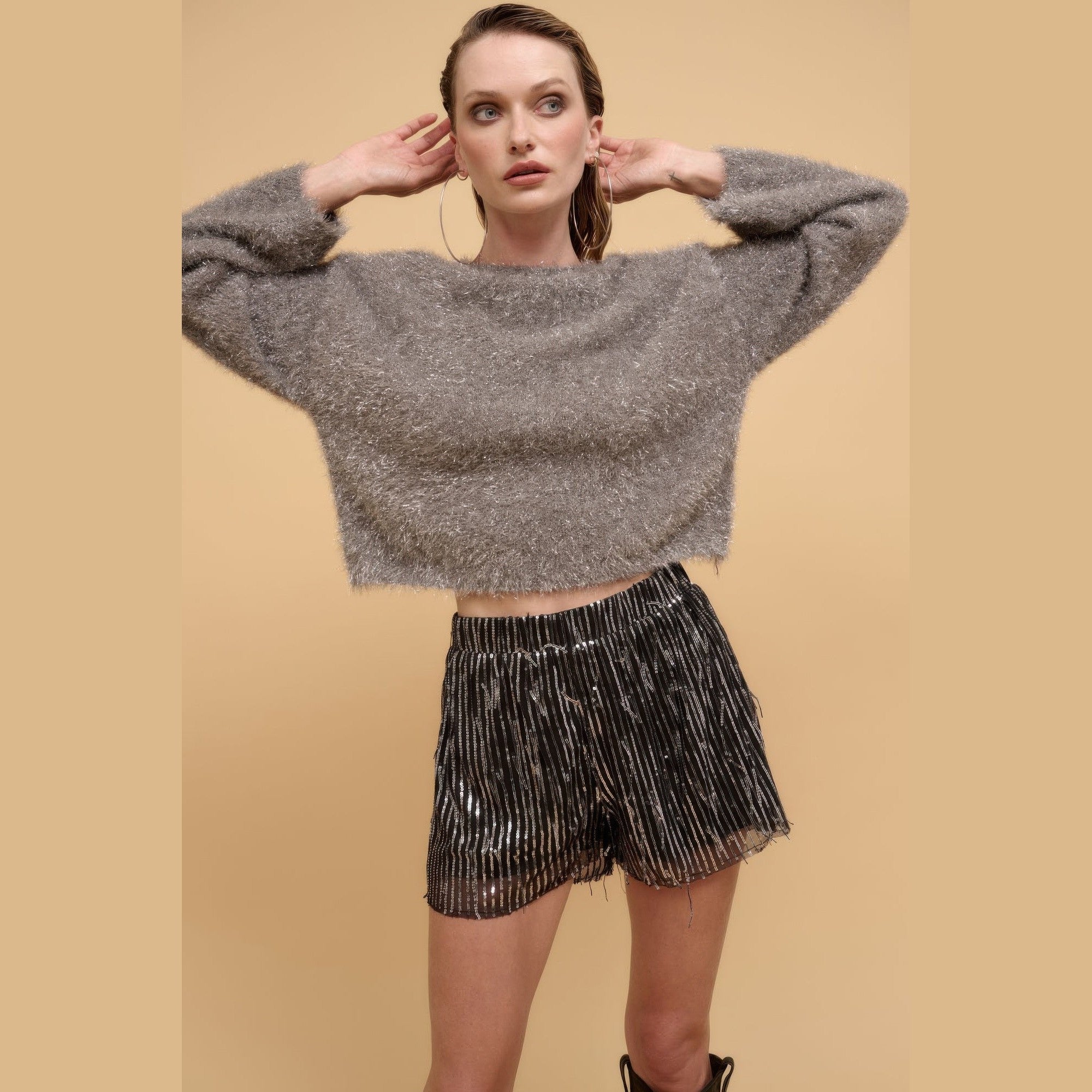 Women's striped sequin high waist shorts by VacationGrabs paired with a fuzzy gray sweater