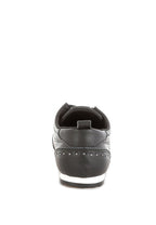 Women's black studded leather sneakers for casual wear