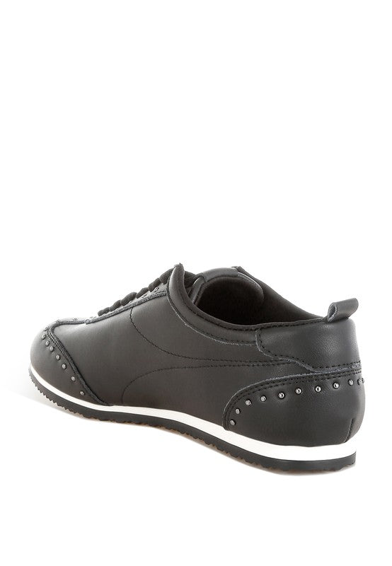 Women's black studded leather sneakers for casual wear