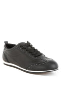 Women's studded leather sneakers in black, perfect for casual outings