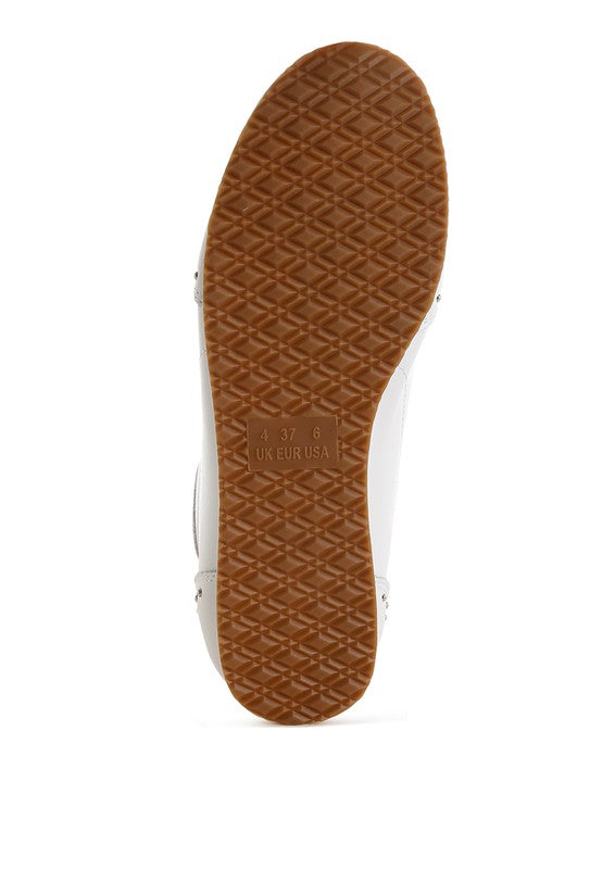 Women's studded leather sneakers with a durable rubber outsole