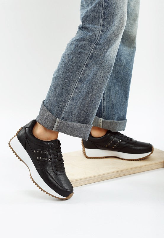 Women's black studded real leather sneakers for casual wear