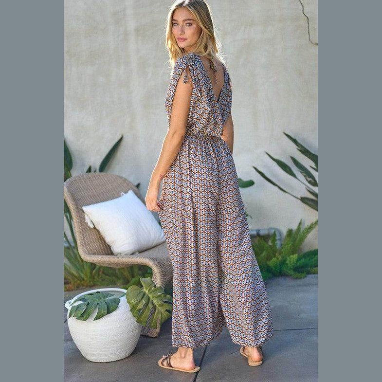 Davi & Dani stylish beachwear for women featuring a patterned jumpsuit with a relaxed fit and back tie detail