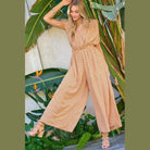 Davi & Dani stylish beachwear for women featuring a patterned jumpsuit with wide legs and short sleeves