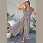 Davi & Dani stylish beachwear for women featuring a patterned jumpsuit with wide legs and a relaxed fit