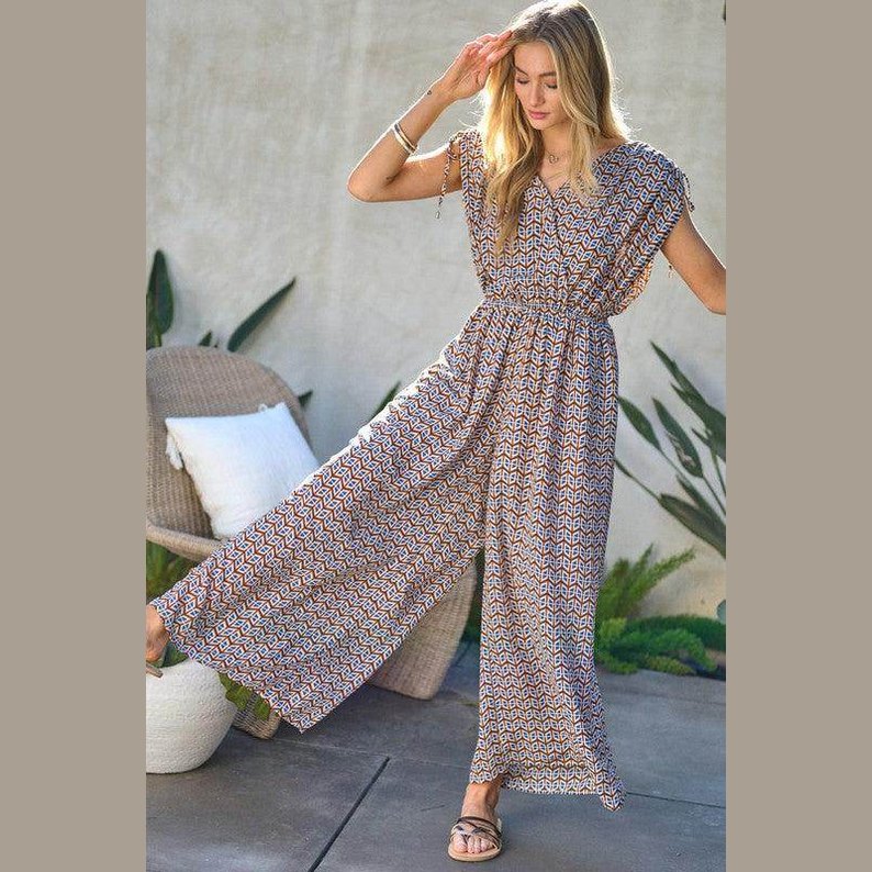 Davi & Dani stylish beachwear for women featuring a patterned jumpsuit with wide legs and a relaxed fit