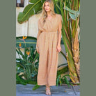 Davi & Dani stylish beachwear for women featuring a patterned jumpsuit with a flowing silhouette
